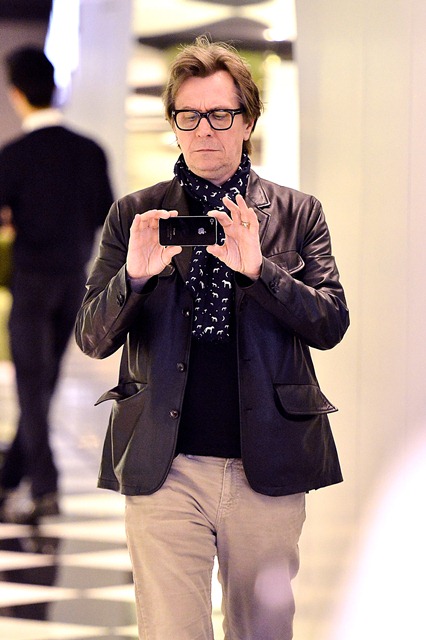 Gary Oldman in animal print scarf shopping with familyLainey Gossip ...